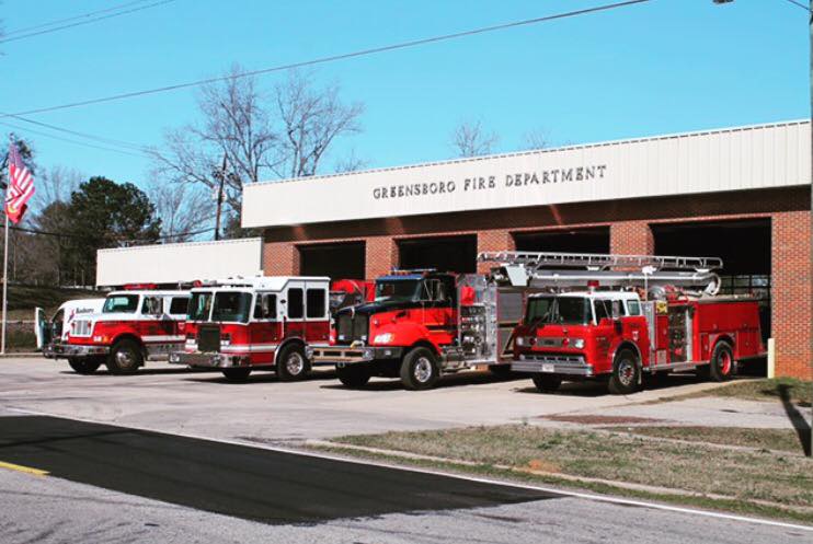 Greensboro Fire Station with all the Trucks Sitting out Front